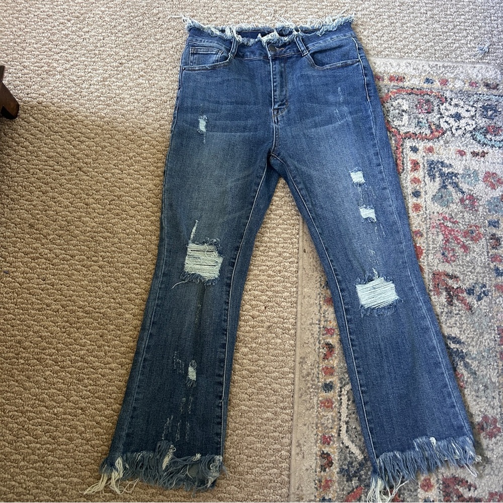 Women’s risen jeans size 5 distressed raw hem denim stretch